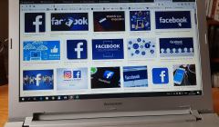 Ekran laptopa, na którym wyświetlnae są różne ikony Facebooka