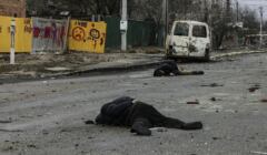 EDITORS NOTE: Graphic content / Dead bodies lie on a street in Bucha, northwest of Kyiv, on April 2, 2022, as Ukraine says Russian forces are making a 